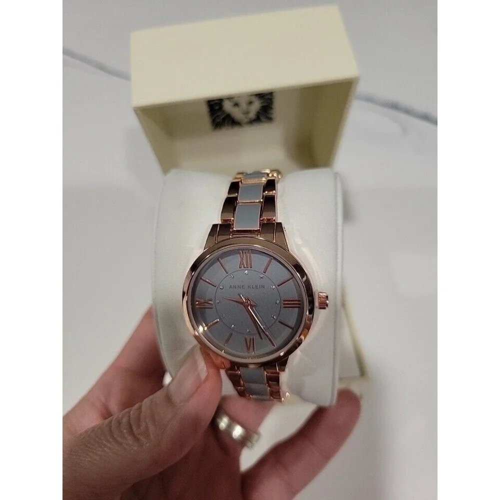Anne Klein Women's Rose Gold-Tone and Light Pink Resin Bracelet Watch